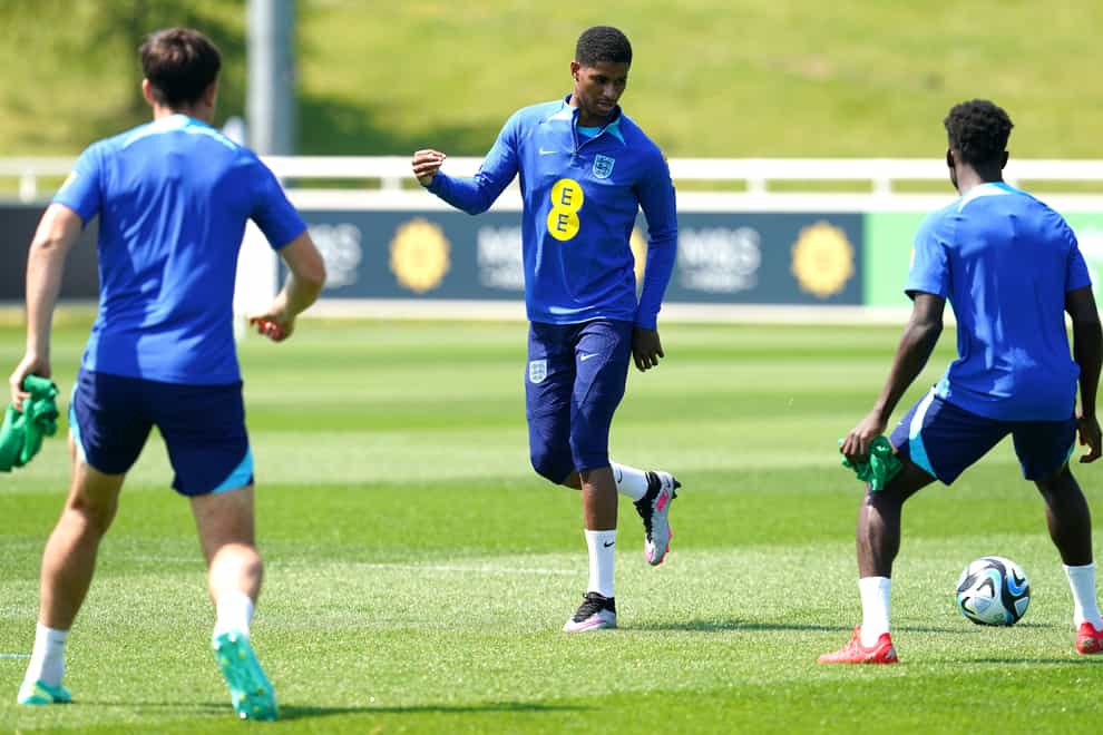 England’s Marcus Rashford (centre) and team-mates during a training session at St. George’s Park, Burton-On-Trent. Picture date: Tuesday June 13, 2023.