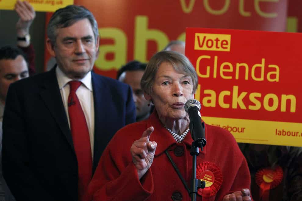 Prime Minister Gordon Brown listens during a speech by Glenda Jackson in 2010 (PA)