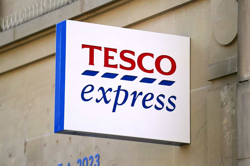 A general view of a sign for a Tesco Express store on in Sheffield, UK (Mike Egerton/PA)