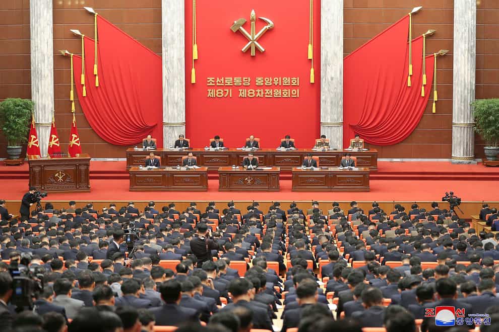 North Korean leader Kim Jong Un, bottom centre on stage, attends an enlarged plenary meeting of the ruling Workers’ Party’s Central Committee at the party’s headquarters in Pyongyang (Korean Central News Agency/Korea News Service via AP)