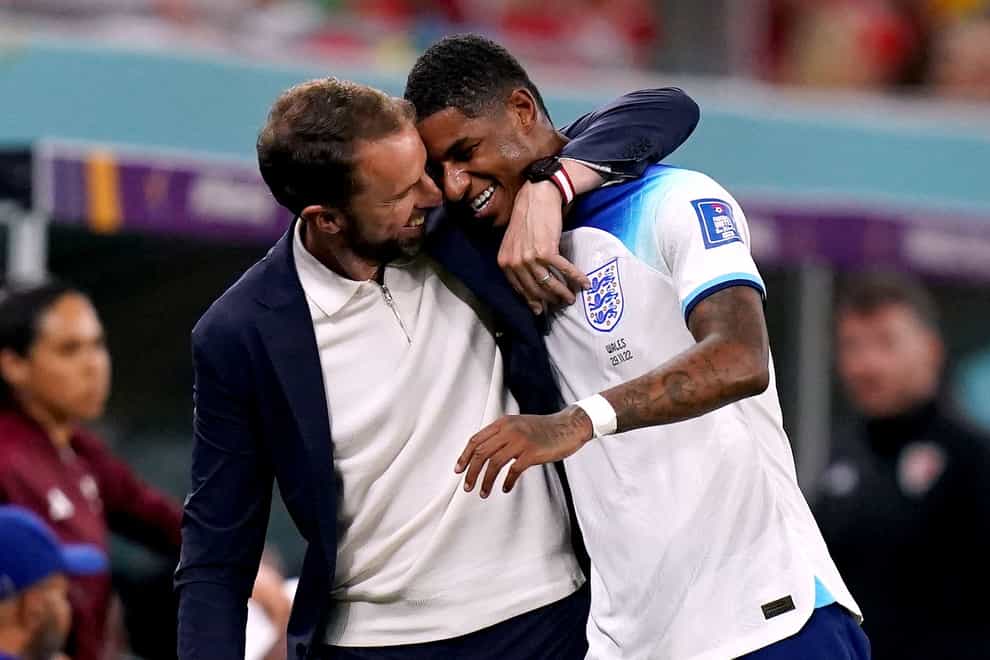 England’s Marcus Rashford with manager Gareth Southgate as he is substituted during the FIFA World Cup Group B match at the Ahmad Bin Ali Stadium, Al Rayyan, Qatar. Picture date: Tuesday November 29, 2022.