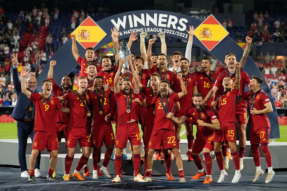 Spain celebrate their Nations League triumph after beating Croatia on penalties in Rotterdam (Martin Meissner/AP)