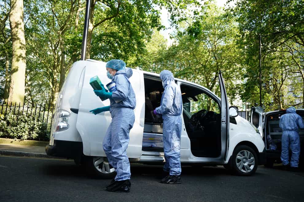 Police forensics officers at the scene in Paddington Green in London (James Manning/PA)