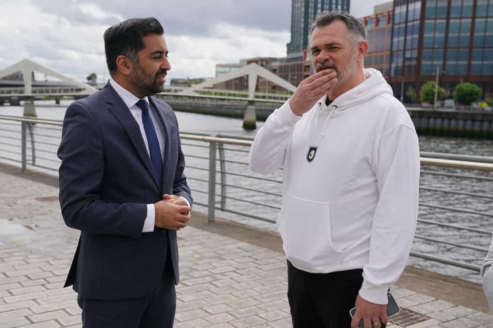 First Minister Humza Yousaf meets Georgia manager Willy Sagnol, right, in Glasgow (Andrew Milligan/PA)