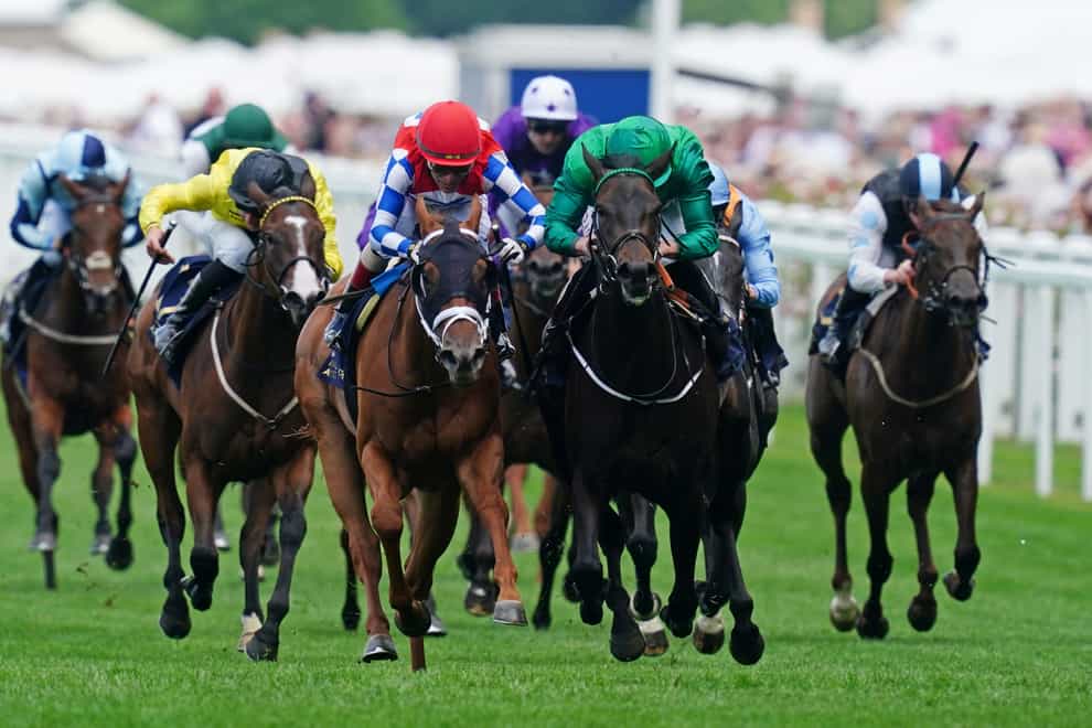 Crimson Advocate (red cap) repels Relief Rally to win the Queen Mary Stakes at Royal Ascot (David Davies/PA)