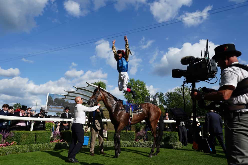 Frankie Dettori leaps from Gregory after winning the Queen’s Vase at Royal Ascot (David Davies/PA)