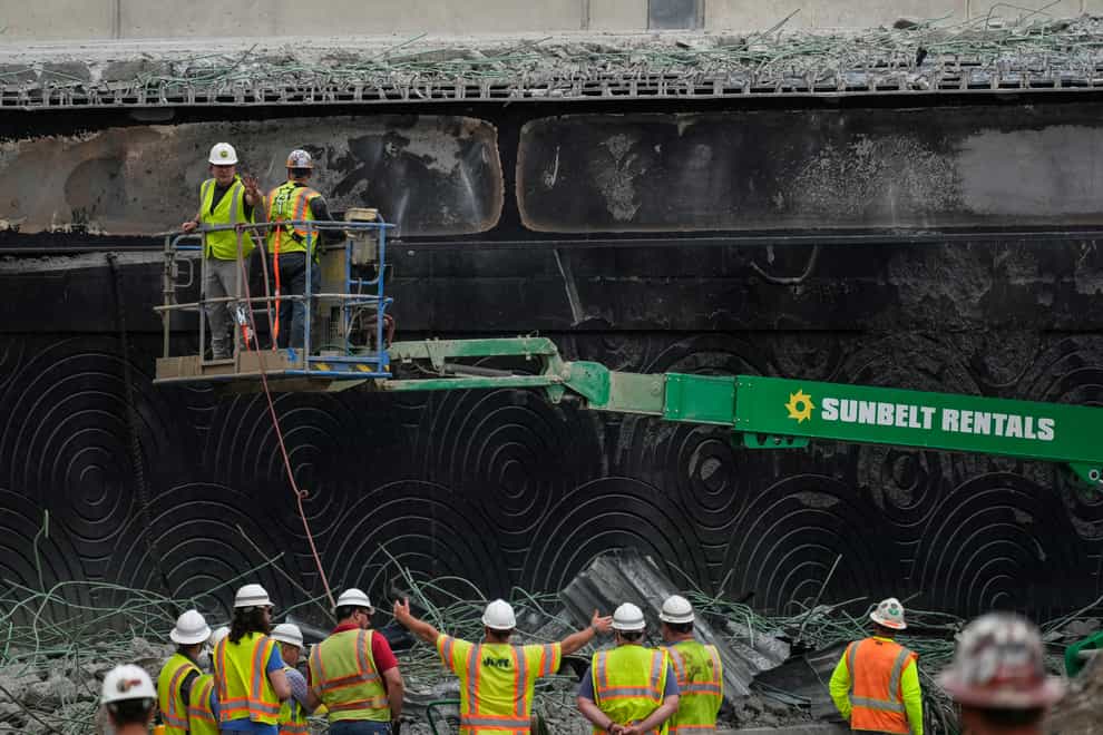 Crews worked around the clock to repair the highway as soon as possible (Matt Rourke/AP, File)
