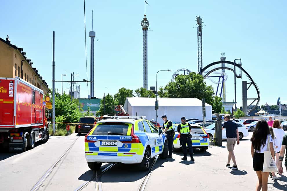 Police cordon off the Grona Lund amusement park in Stockholm (Claudio Bresciani/TT News Agency via AP)