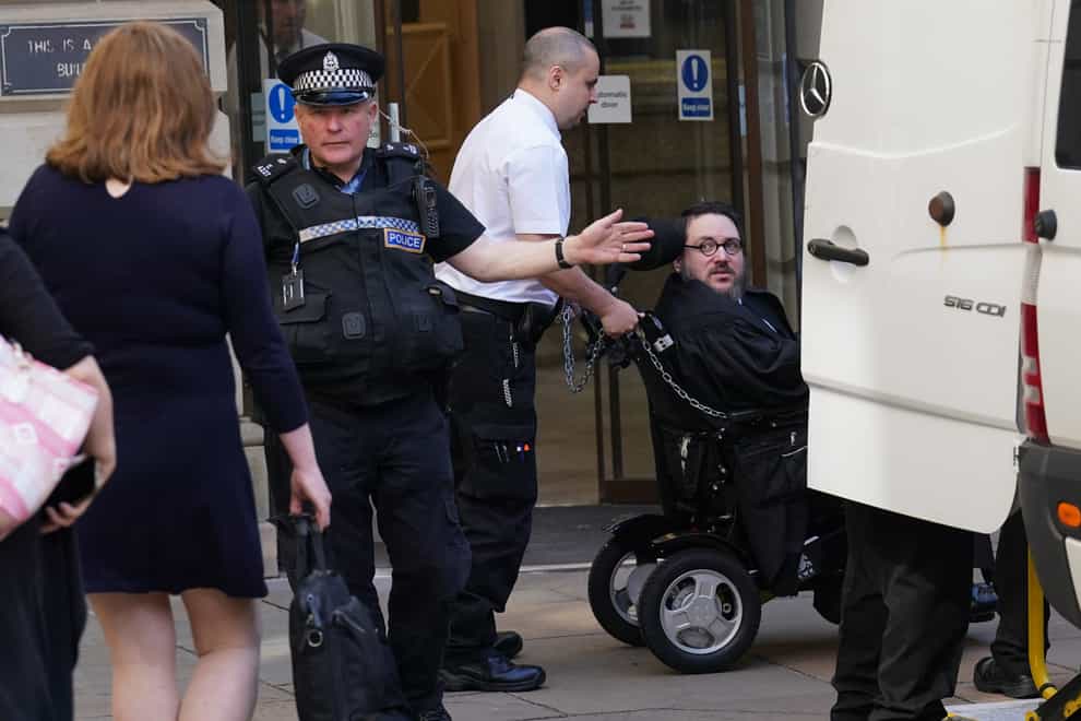 Nicholas Rossi arrives at Edinburgh Sheriff Court for an extradition hearing (Andrew Milligan/PA)