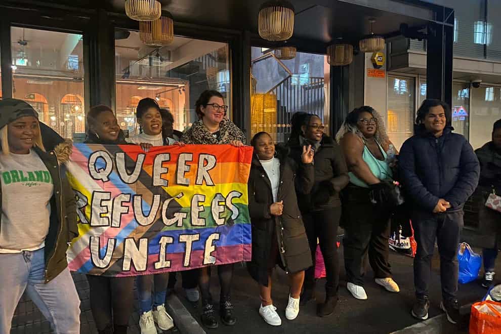 Sarah Cope (middle) with members of Queer Refugee Unite who will attend the Pride Parade in London to ‘affirm and celebrate’ LGBTQ+ asylum seekers (Sarah Cope/PA)