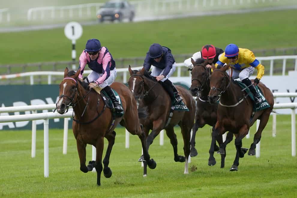 Via Sistina (left) ridden by jockey Jamie Spencer on their way to winning the Yulong Pretty Polly Stakes (Brian Lawless/PA)