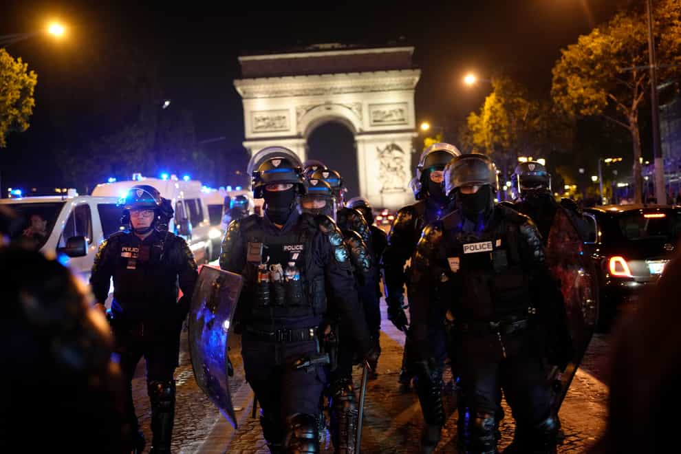 Young rioters clashed with police as France faced a fifth night of unrest sparked by the police killing of a teenager, but overall violence appeared to be reduced compared with previous nights (Christophe Ena/AP)