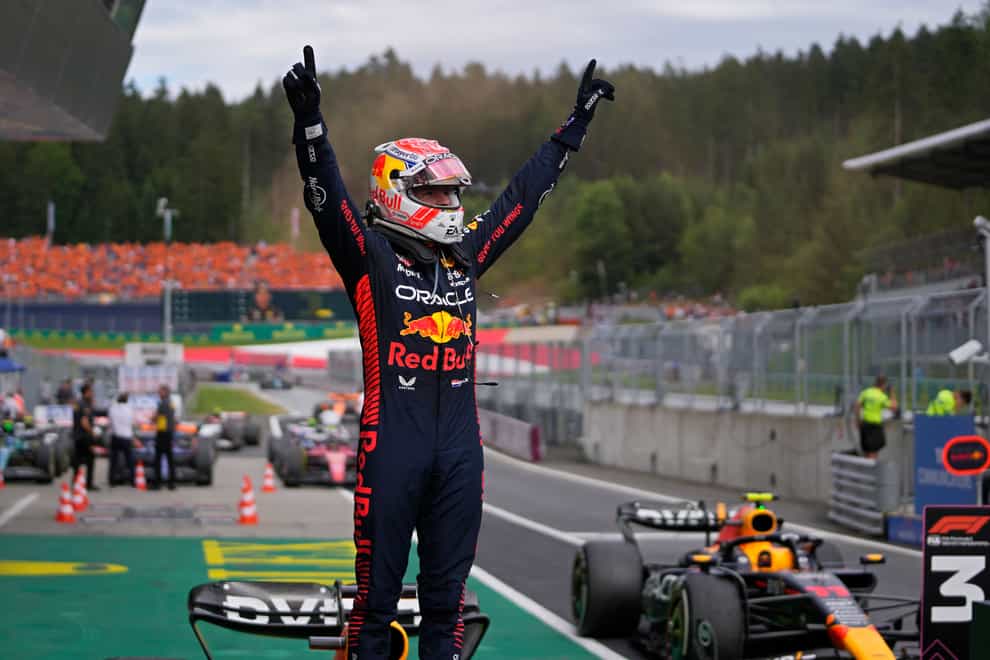 Red Bull driver Max Verstappen celebrates his victory (AP)