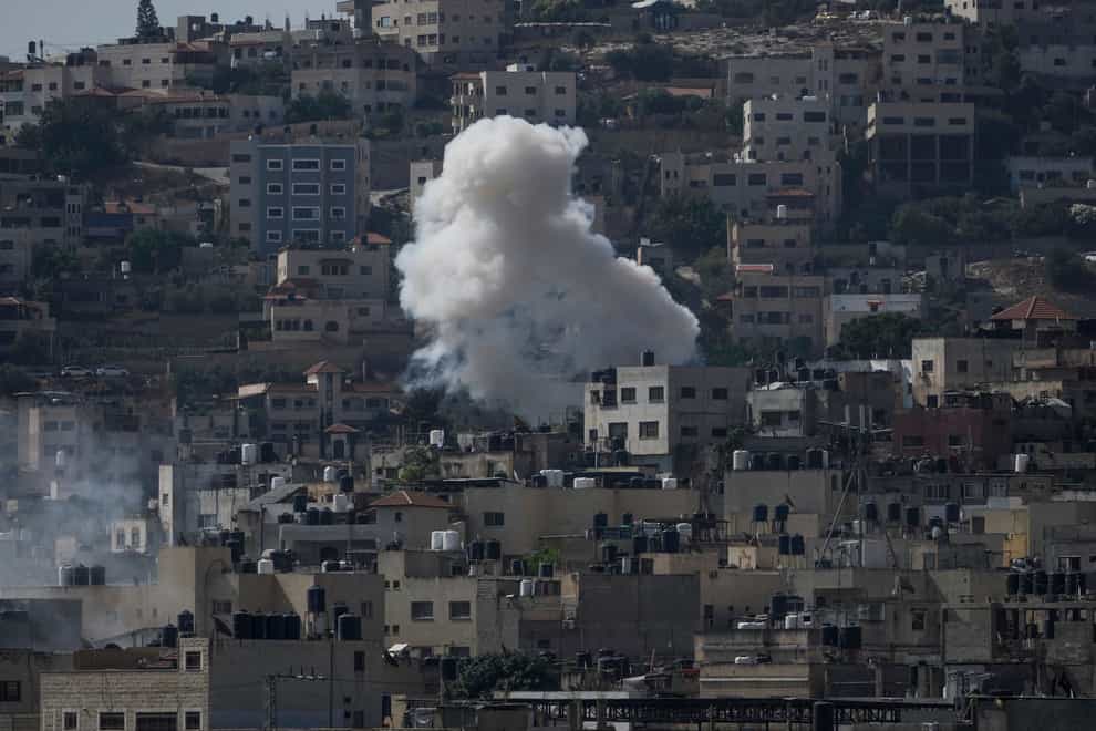 At least four Palestinians were killed when Israeli drones struck targets in a militant stronghold in the occupied West Bank (Majdi Mohammed/AP)