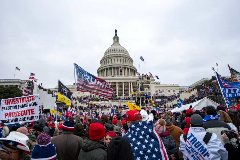 Rioters loyal to Donald Trump rally at the US Capitol in Washington (Jose Luis Magana/AP)