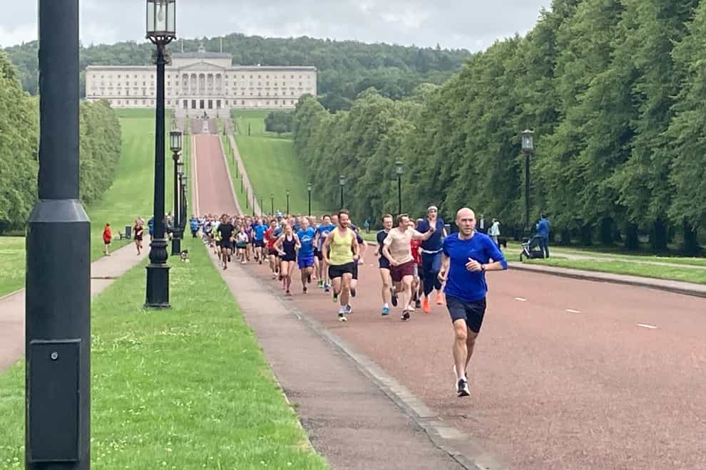 Runners take part in a Parkrun to mark the 75th anniversary of the NHS (Rebecca Black/PA)