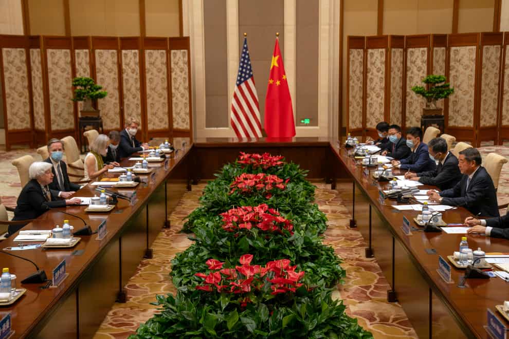 Treasury Secretary Janet Yellen, left, speaks as Chinese vice premier He Lifeng, right, listens during a meeting in Beijing (Mark Schiefelbein/AP)