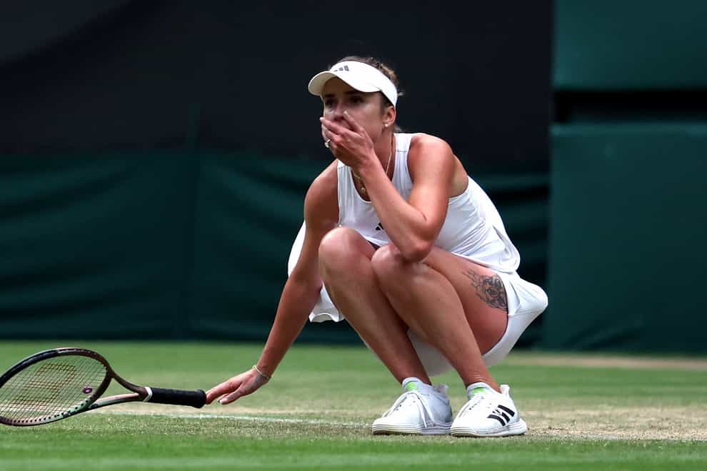 Elina Svitolina crouches down following her victory over Victoria Azarenka (Steven Paston/PA)