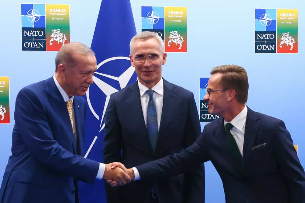 Turkey’s President Recep Tayyip Erdogan, Sweden’s Prime Minister Ulf Kristersson, right, and Nato secretary general Jens Stoltenberg met for talks ahead of the Nato summit (Yves Herman/Pool Photo/AP)