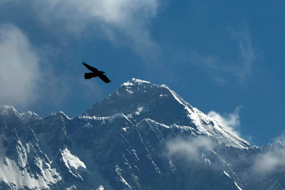 A helicopter is missing in the Mount Everest area (Niranjan Shrestha/AP)