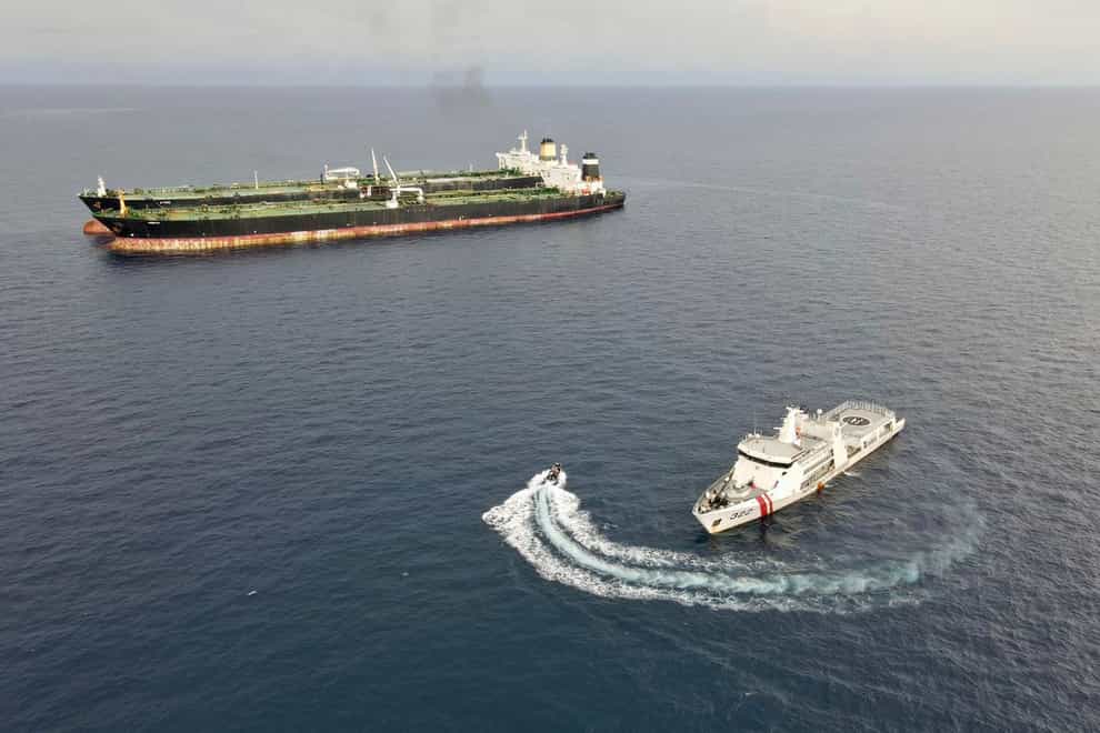 Indonesian authorities said they have seized an Iranian tanker and arrested its crew members for illegally transferring oil to another vessel in the country’s exclusive economic zone (Bakamla/AP)