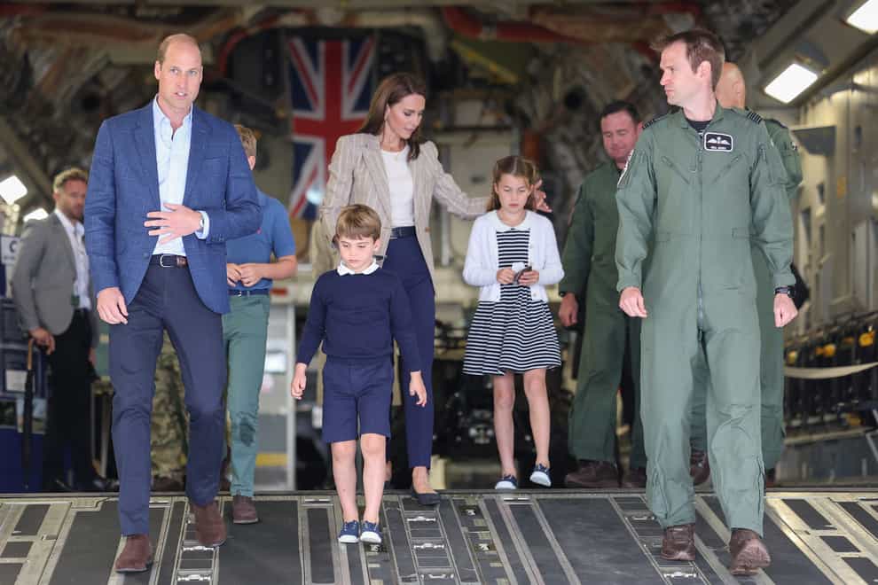 The Prince and Princess of Wales with Prince George, Princess Charlotte and Prince Louis on a C-17 aircraft (Chris Jackson/PA)