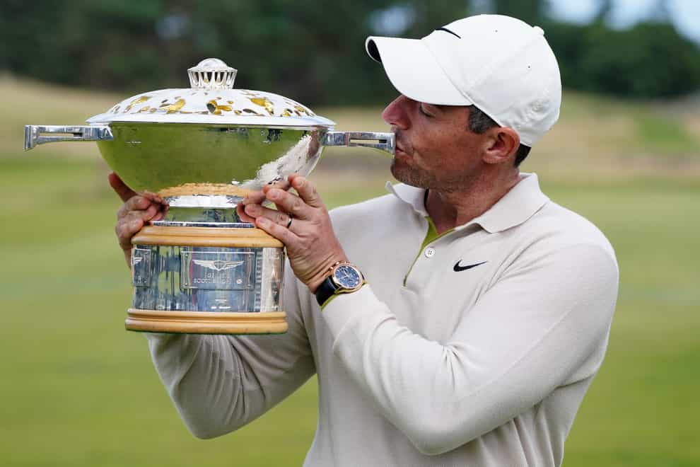Rory McIlroy kisses the trophy (Jane Barlow/PA)