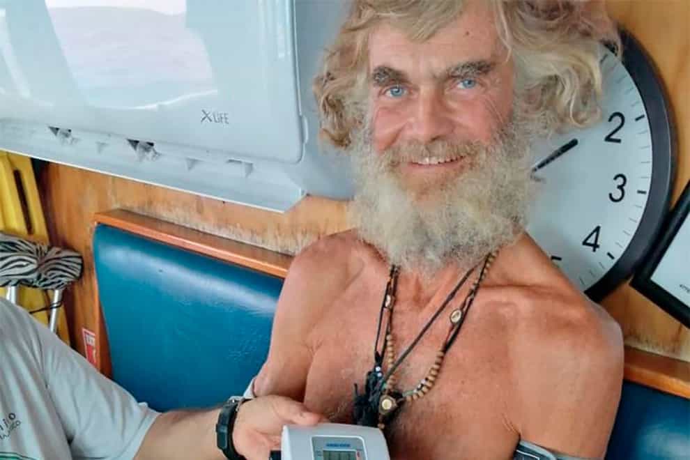 Australian Tim Shaddock has his blood pressure taken after being rescued by a Mexican tuna boat in international waters (Grupomar/Atun Tuny/AP)
