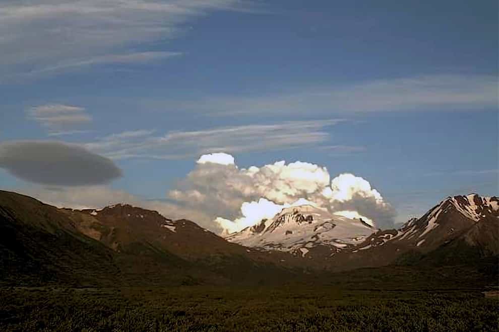 This web camera image provided by the US Geological Survey shows a low-level ash plume from the Shishaldin Volcano (Alaska Volcano Observatory/US Geological Survey via AP)