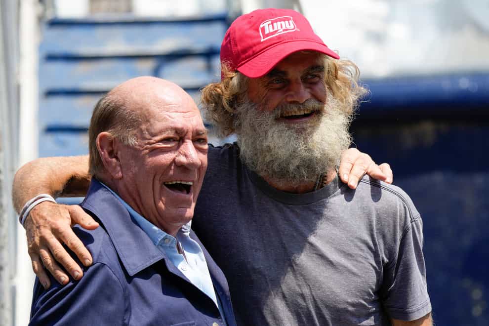 Australian Timothy Lyndsay Shaddock, right, during a welcoming ceremony after being rescued from sea and arriving in Manzanillo, Mexico (Fernando Llano/AP)
