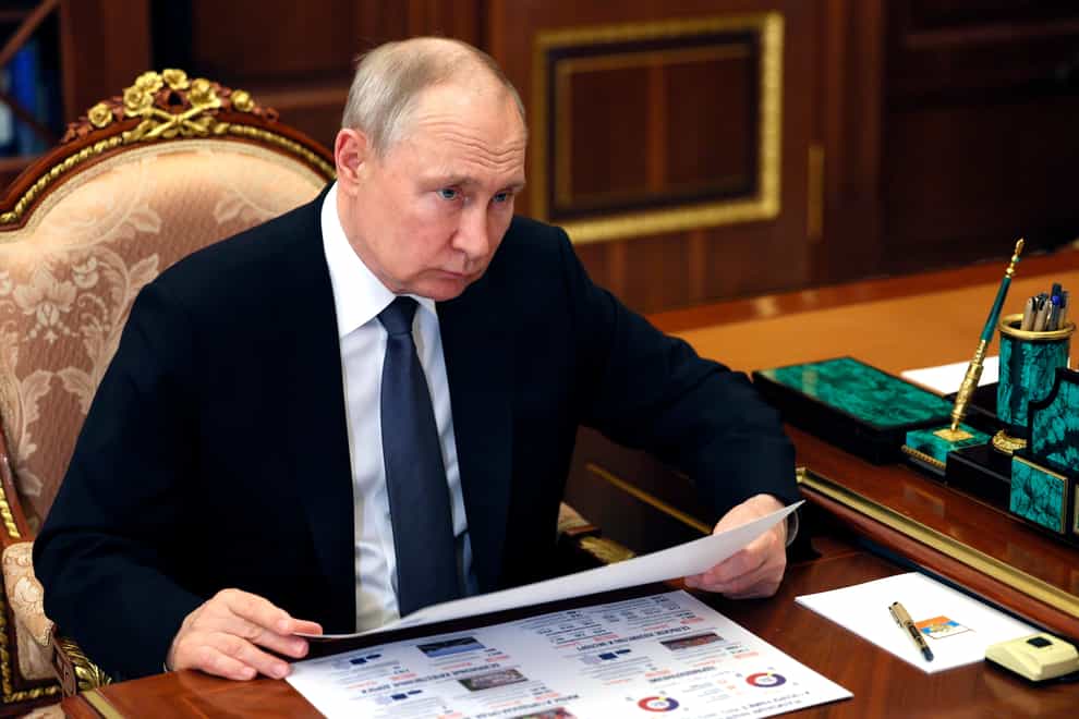 Russian president Vladimir Putin has been indicted for war crimes over the abduction of children from Ukraine (Alexander Kazakov, Sputnik, Kremlin Pool Photo via AP)
