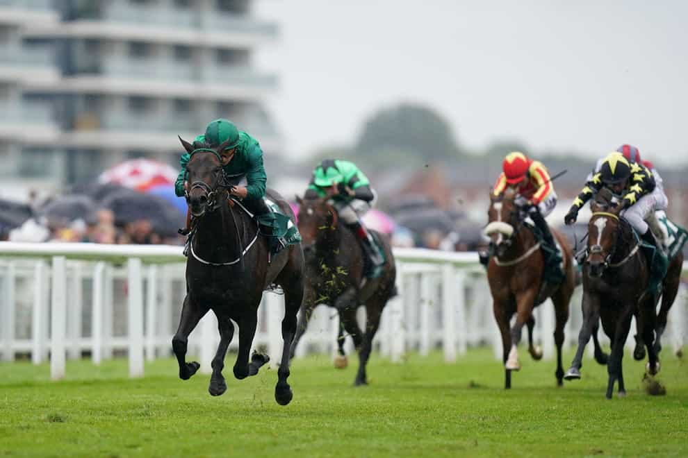 Relief Rally ridden by jockey Tom Marquand (left) coming home to win the Weatherbys Super Sprint Stakes (Adam Davy/PA)