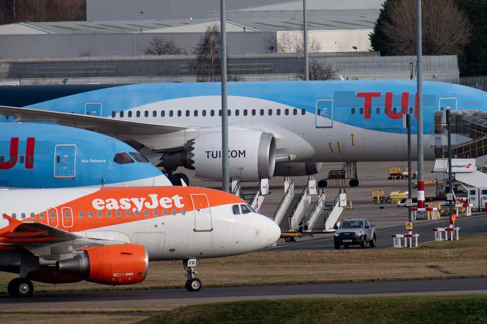 easyJet and Tui have taken different steps in relation to the wildfire in Rhodes (Jacob King/PA)