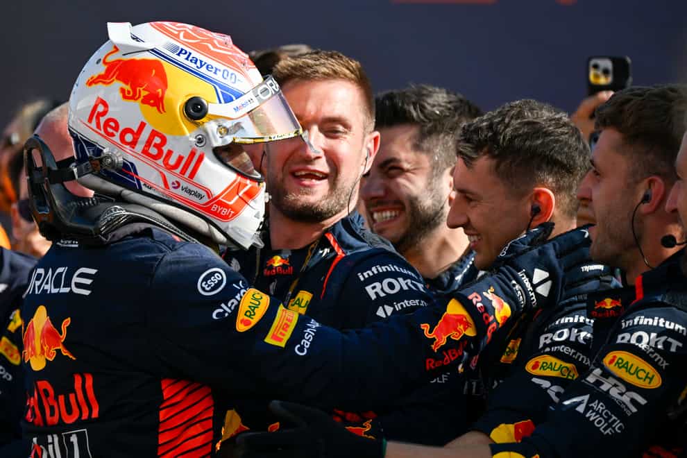Max Verstappen, left, celebrates with his Red Bull team after winning the Hungarian Grand Prix (Denes Erdos/AP)