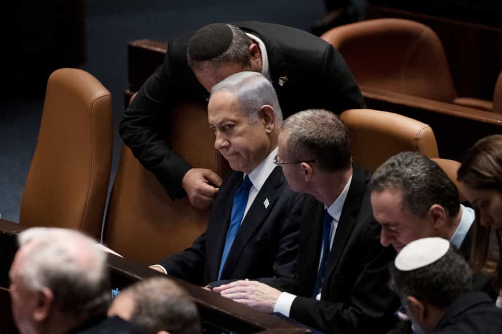 Israel’s Prime Minister Benjamin Netanyahu, centre, at a session of the Knesset, Israel’s parliament, in Jerusalem on Monday (Maya Alleruzzo/AP)