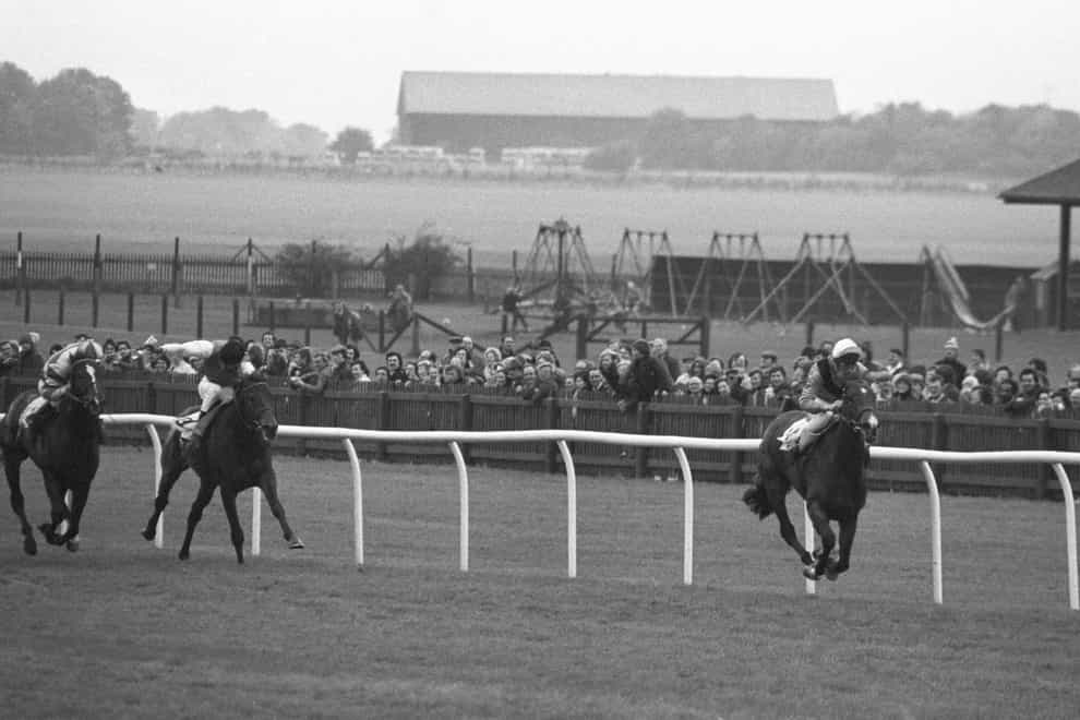 Time Charter and Billy Newnes on their way to Champion Stakes success at Newmarket in 1982 (PA)
