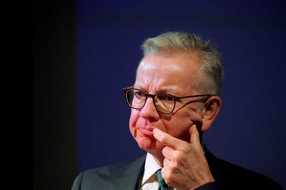 Michael Gove has said the planned ban on selling petrol cars after 2030 will go ahead (Yui Mok/PA)