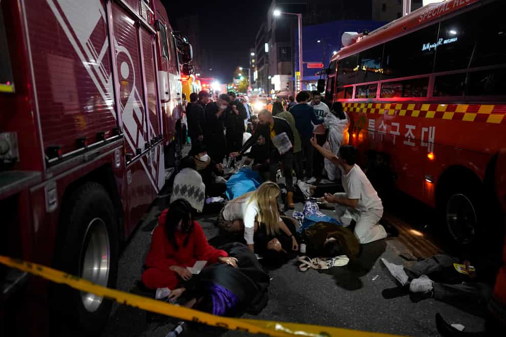 The crush in Seoul left many revellers injured (Lee Jin-man/AP)