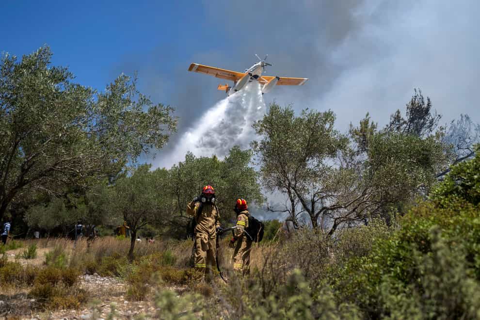 A firefighting plane has crashed (Petros Giannakouris/AP)