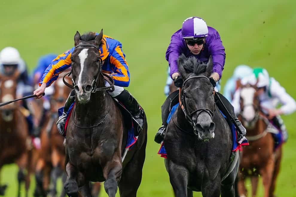 Auguste Rodin (left) and King Of Steel finishing first and second in the Derby at Epsom (David Davies/The Jockey Club)