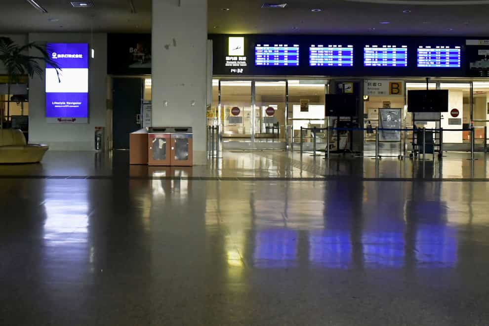 Naha airport is deserted as it is closed due to approaching typhoon in Naha, Okinawa (Kyodo News/AP)