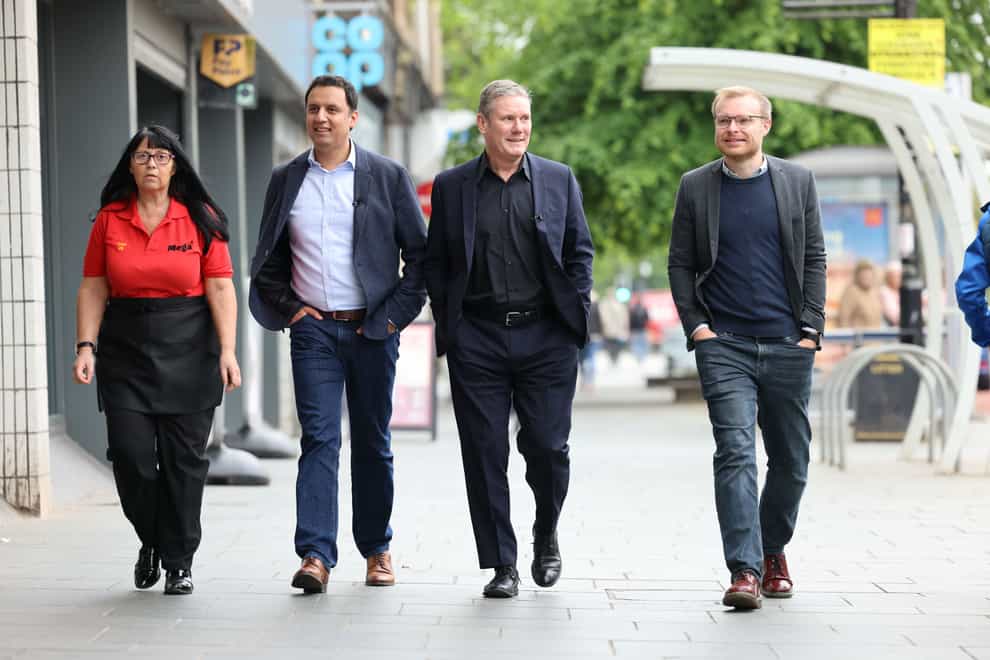 Rutherglen and Hamilton West Scottish Labour candidate Michael Shanks (right) pictured with Labour leader Sir Keir Starmer and Scottish Labour leader Anas Sarwar during an earlier visit to Rutherglen, South Lanarkshire (PA)