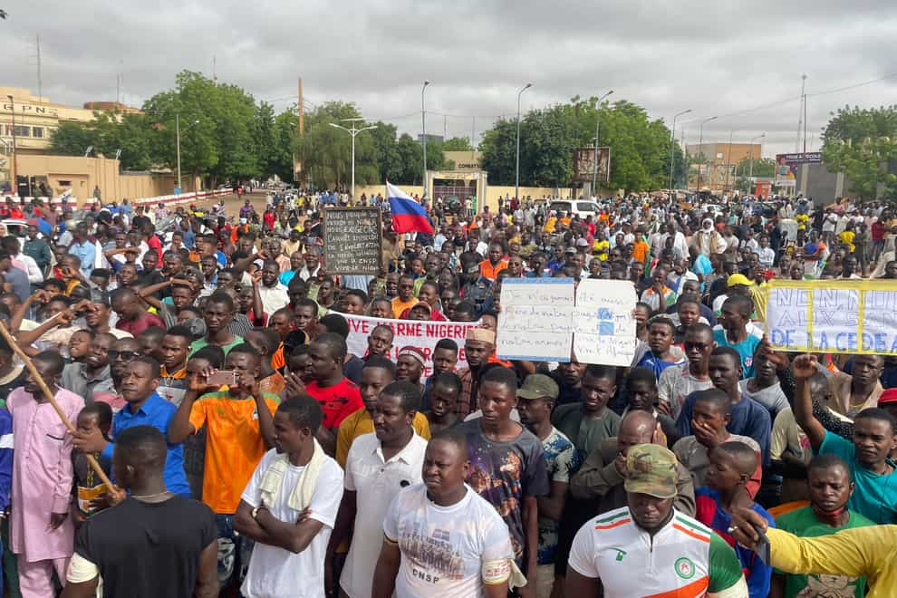 Supporters of Niger’s ruling junta gather for a protest called to fight for the country’s freedom and push back against foreign interference, in Niamey, Niger (Sam Mednick/AP)