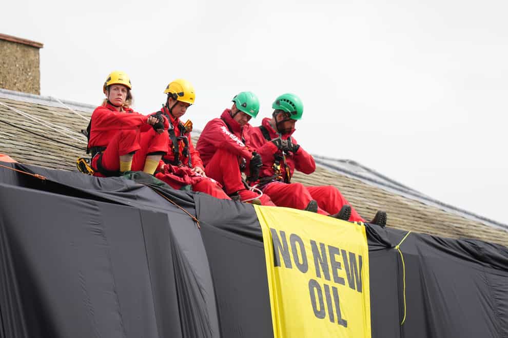 Greenpeace activists on the roof of Prime Minister Rishi Sunak’s house in North Yorkshire have now been bailed (Danny Lawson/PA)