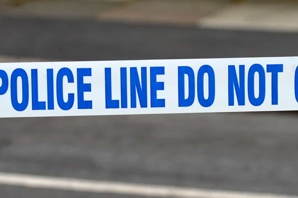 A generic stock photo of police tape outside a crime scene (Peter Byrne/PA)