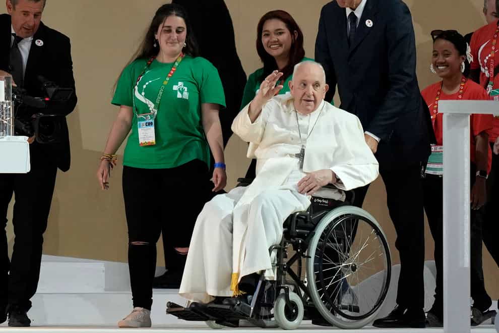 Pope Francis arrives for the 37th World Youth Day flock to the Parque Tejo in Lisbon (AP)