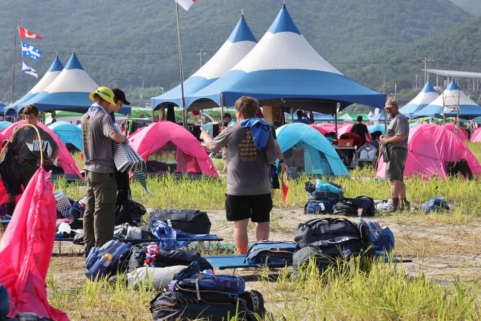 US scout members prepare to leave the World Scout Jamboree campsite in Buan (Yonhap via AP)