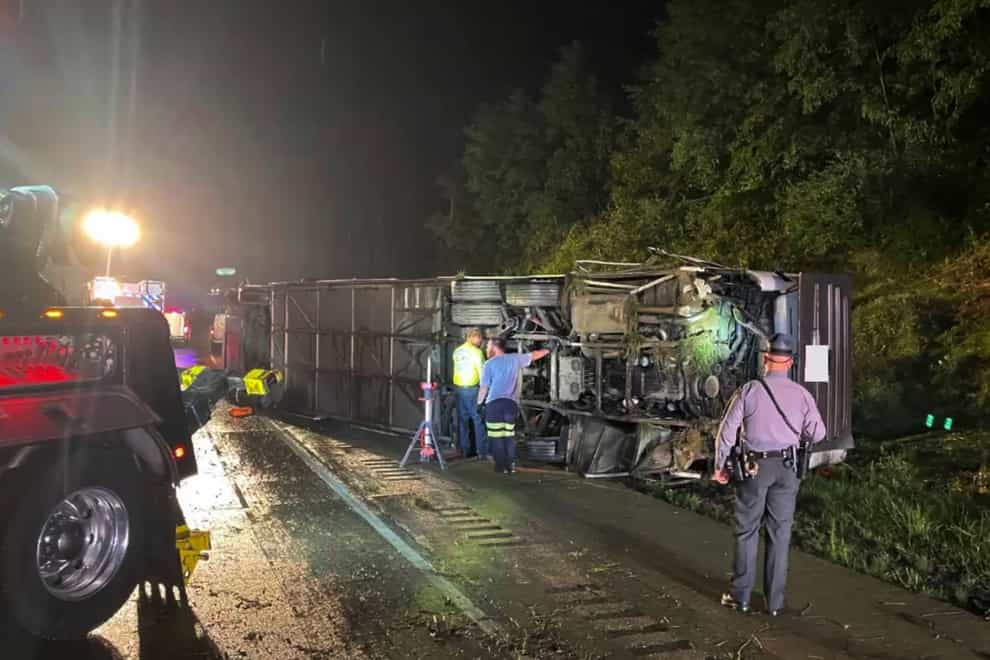 he crash occurred between a passenger vehicle and charter bus carrying up to 50 passengers (Pennsylvania State Police via AP)