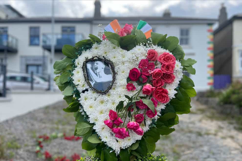 A wreath left at a memorial for Sinead O’Connor outside her former home in Bray (Claudia Savage/PA)