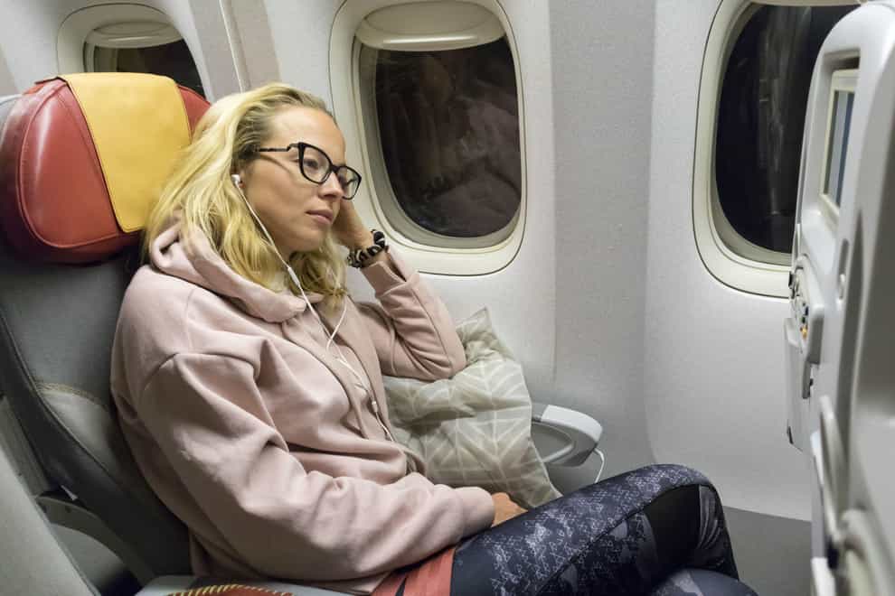 Sleeping well on a plane can be problematic (Alamy/PA)